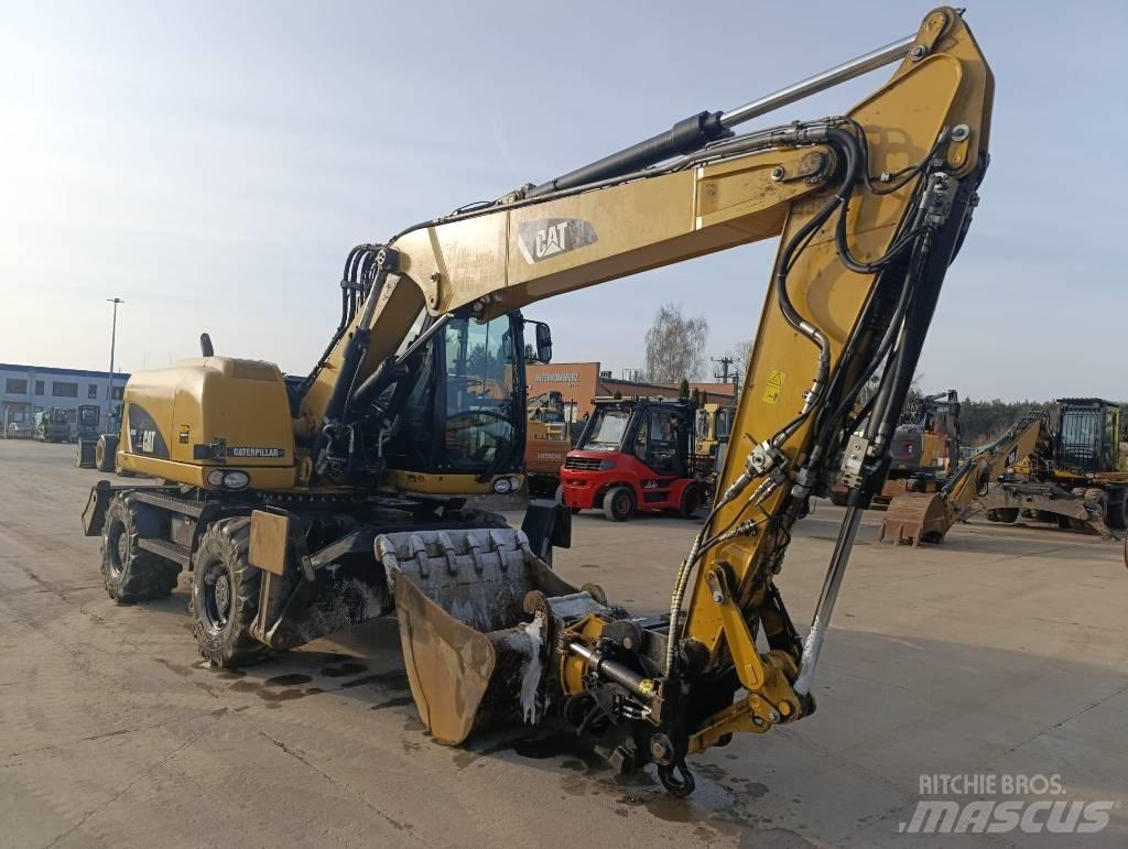 CAT M 313 D Wheeled excavators