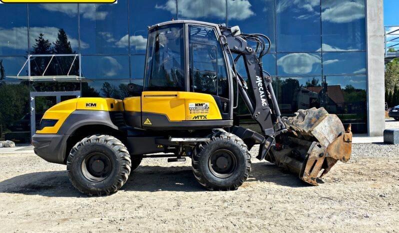 Mecalac 12 M TX Backhoe