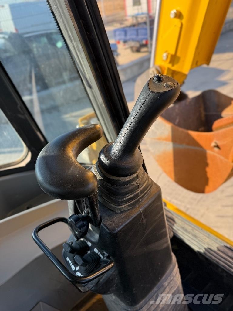 New Holland B 115 Backhoe