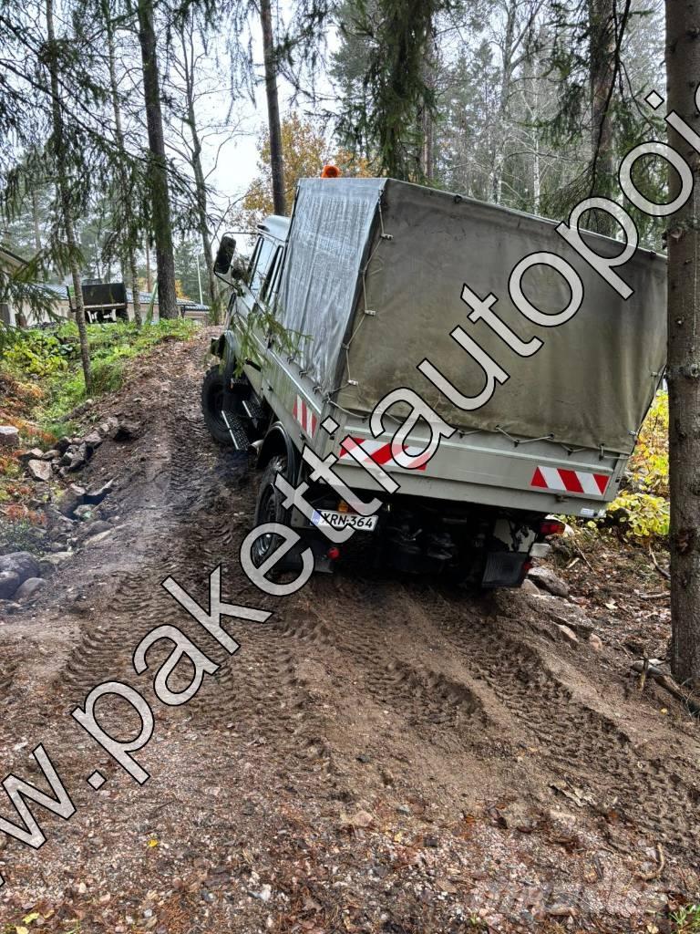 Unimog U 1250L DoKa Curtain sider trucks