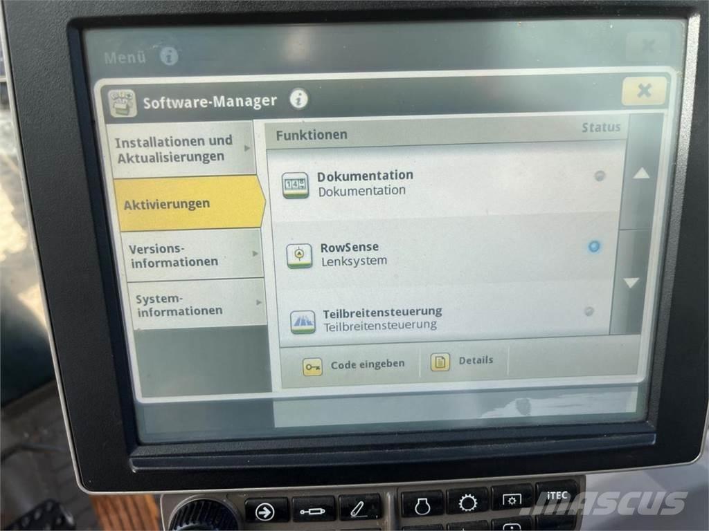 John Deere 6215R Tractors