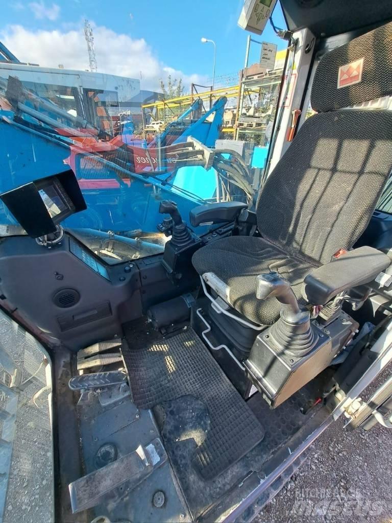 Fuchs MHL 320 Waste / industry handlers