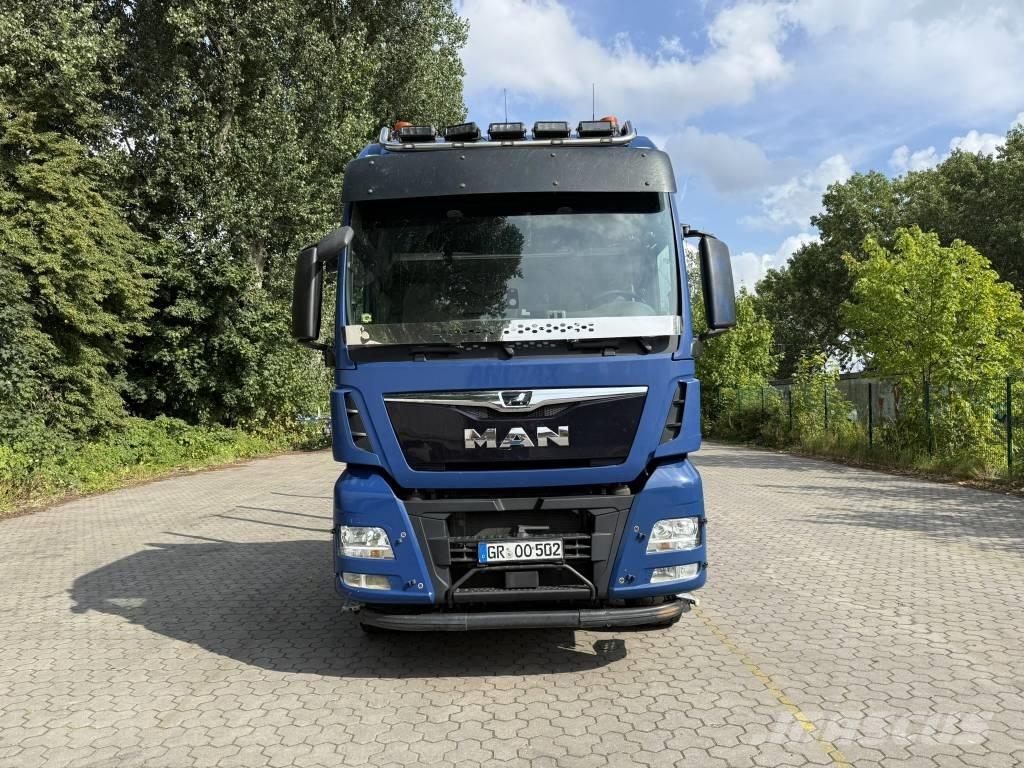 MAN TGX 33.500 Forest machine transport trucks