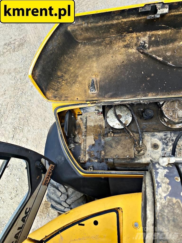 Mecalac 12 M TX Backhoe