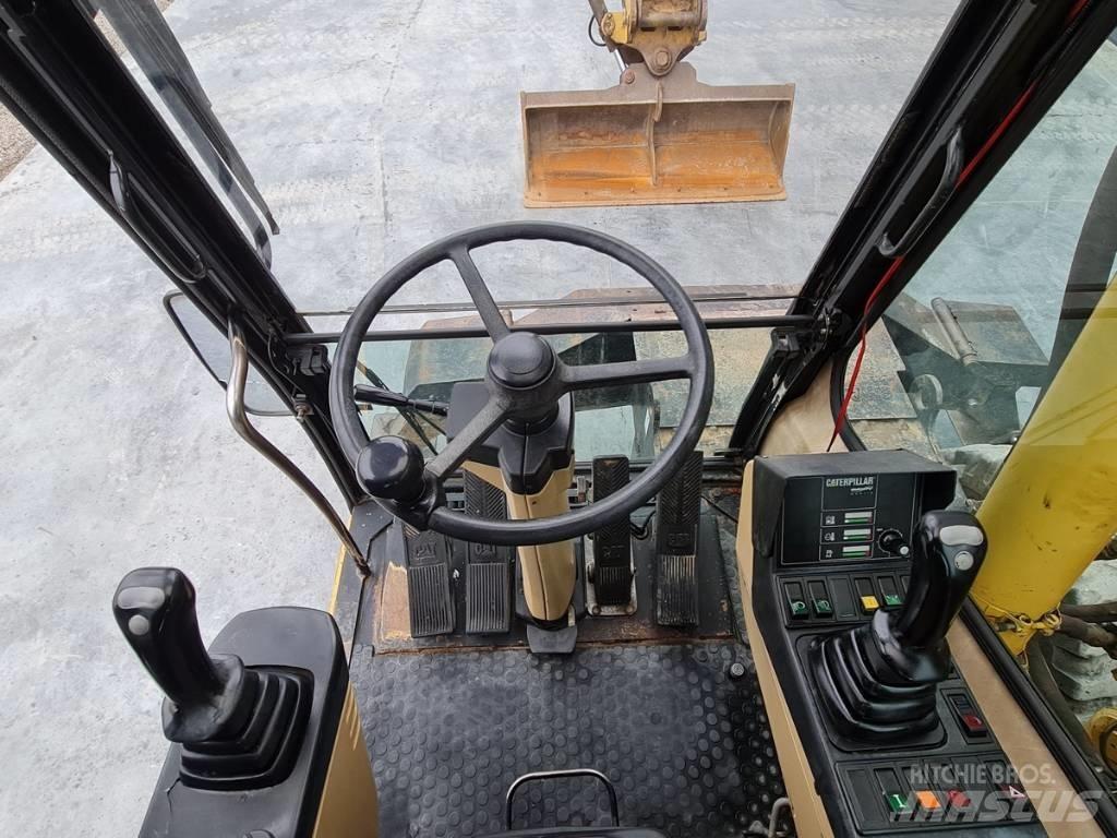 CAT M 312 Wheeled excavators