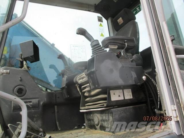 Fuchs MHL 320 Waste / industry handlers