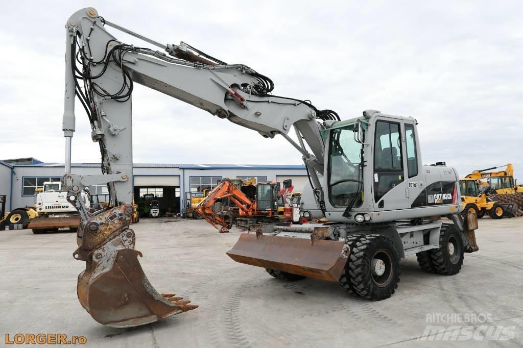CAT M 313 D Wheeled excavators