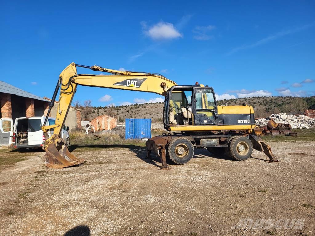 CAT M318c Wheeled excavators