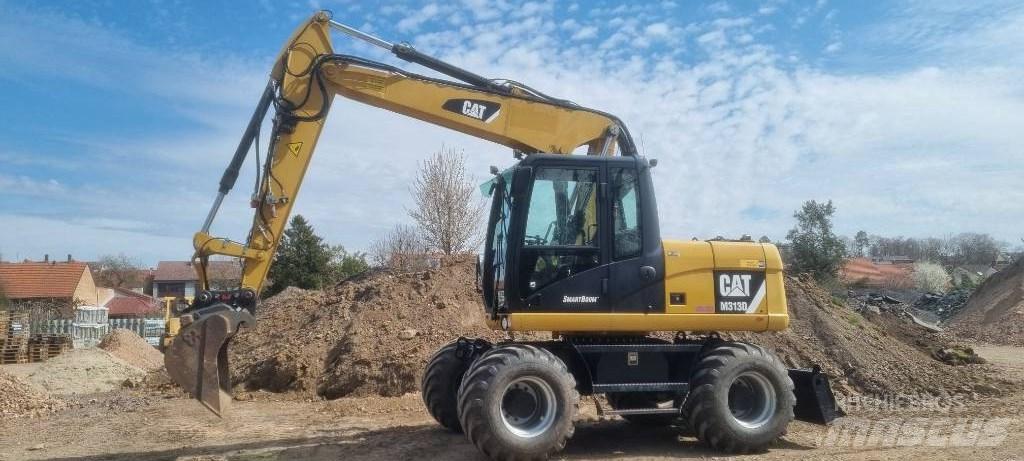 CAT M 313 D Wheeled excavators