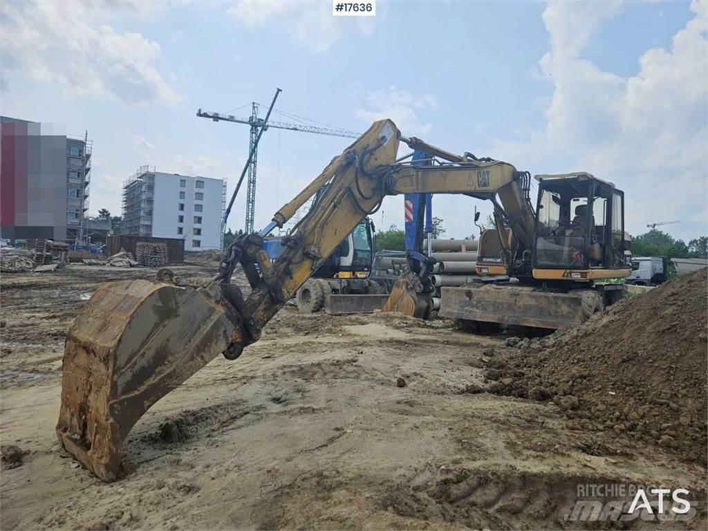 CAT M312 Wheeled excavators