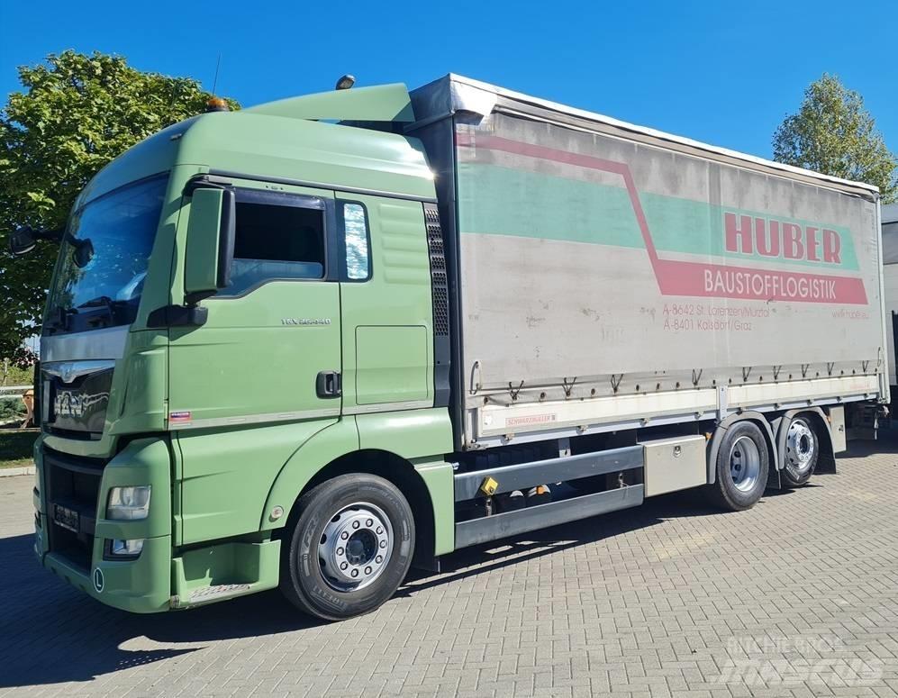 MAN 26.440 / 7.4m / LIFT Curtain sider trucks