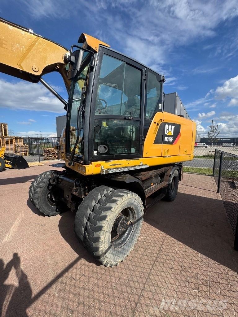 CAT 318 Wheeled excavators