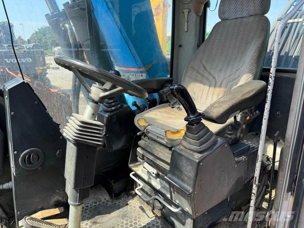 Fuchs MHL 320 Waste / industry handlers