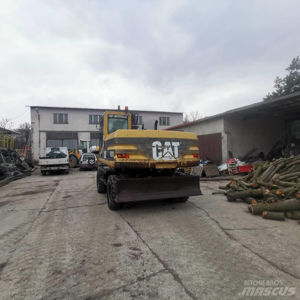 CAT M 318 B Wheeled excavators