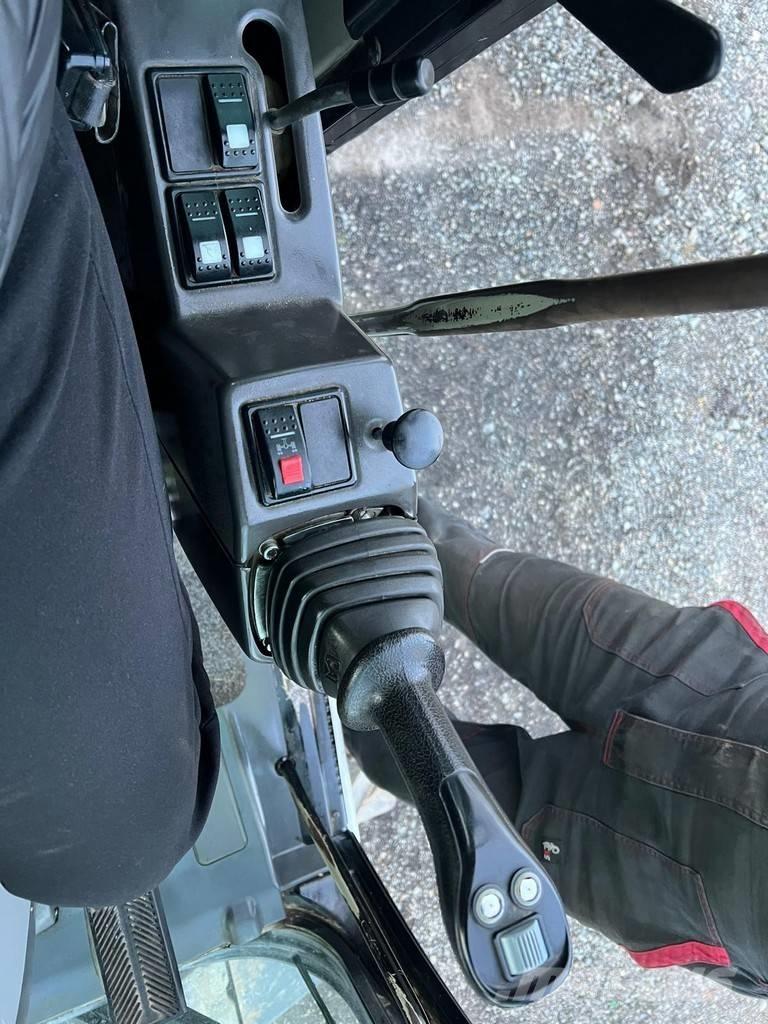 CAT M 313 D Wheeled excavators