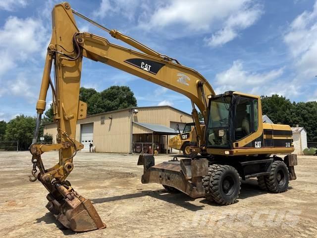 CAT M318 Wheeled excavators