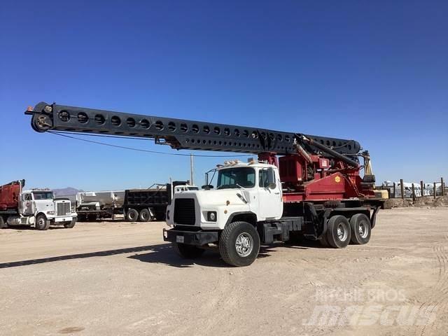 Mack DM690S Truck mounted drill rig
