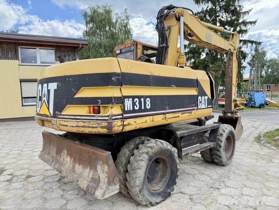 CAT M318 Wheeled excavators