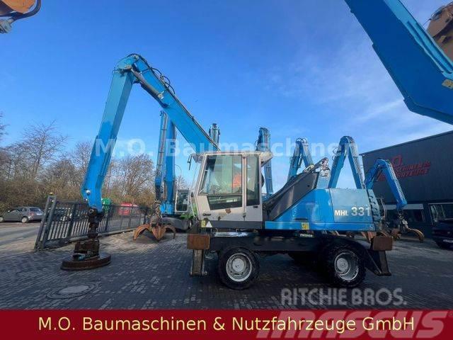 Fuchs MHL 331 / ZSA / AC / Hochfahrbare Kabine /Magnet Wheeled excavators